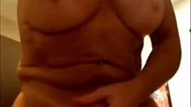 Busty tranny plays with her cock and cums