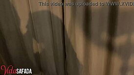 being intimate with the young girl in front of the fireplace