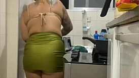 Live in kitchen, mini skirt flashing swollen pussy