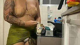 Live in kitchen, mini skirt flashing swollen pussy