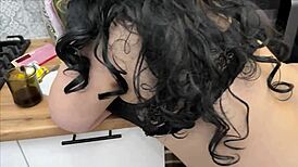 the stepmom stands in her panties in the kitchen and takes the stepsons cock in her hand to give a blowjob and have anal sex