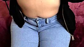 hot wife gets fucked doggystyle in tight jeans and takes cumshot on ass