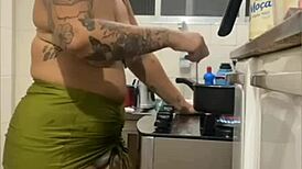 Live in kitchen, mini skirt flashing swollen pussy