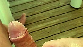 Solo guy masturbates monster cock near orgasm on terrace