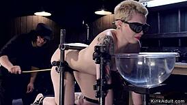 Blonde slave gets caned in doggy bondage