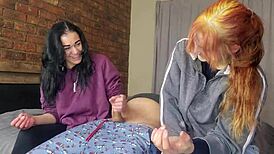 Two Shy Girls Teasing Massive Cock in Group Play