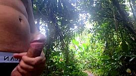 Risky handjob for cute brunette on beach trail