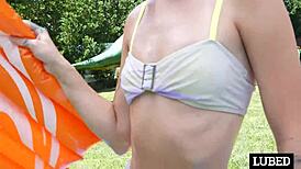 ashlyn slips and slides on a big cock in the summer sun, getting wet and creampied.