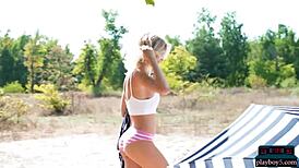 Big natural tits teen eva tali strips naked outdoors for playboy