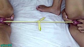 Two lesbians perform extreme prolapse insertions at the same time