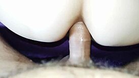 My wife enjoys stretching her body with a large object in close-up view