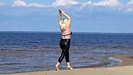 Big Leather Ass Walks on Beach in Heels