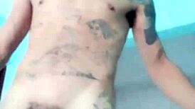 Slim guy shows his toy in living room