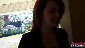 In this story, redhead coed Ravyn starts by rubbing her small tits, then uses a dildo to poke her shaved pussy.