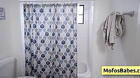 sexy blonde chloe rose massages her natural boobs after a shower, then fingers her pink bald pussy.