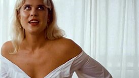 Petite Australian MILF slowly undresses to reveal her round tits and sandy bubble butt in a sensual striptease.