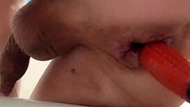 My prolapse leaks natural lubricant while I squirm from intense anal stretching!