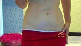 Horny milf with a hairy cunt and a bouquet of flowers strips and opens her fucking holes for her fans on the couch angela-milf