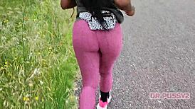 Ebony Woman with Large Butt in Leggings Running Alone in the Forest