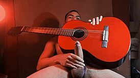 Muscular Asian bodybuilder plays Yamaha guitar in China