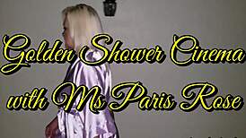 Ms. Paris Rose flashes her pierced nipples in a golden shower at the cinema. 😜