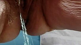 Feeling the Release as Hairy Pussy Sprays Urine in Intense Pleasure
