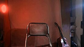 Muscular Asian bodybuilder plays Yamaha guitar in China