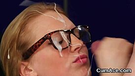 Nasty stunner gets cum shot on her face sucking all the juice