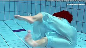 piyavka chehova's big bouncy juicy tits bounce underwater as she bathes in the pool