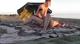 flashing pussy to young guy on public beach, he helps me squirt riskily.