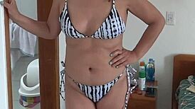 Stepmom teases in bikini on beach 😏