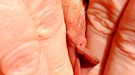 mature wife spreading shaved pussy for close-up massage