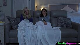 intense family emotions as teen shares couch with stepdad watching movie