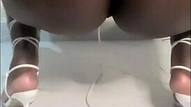 big oiled booty twerks teasingly with and without thong