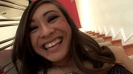 Asian Girl Enjoys Quiet Moments In Bedroom Setting