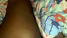 Aline Lounging on the Bed in a Cozy Setting