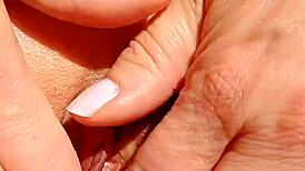 mature wife spreading shaved pussy for close-up massage