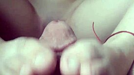 Petite girl gives footjob while masturbating passionately!