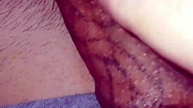 Detailed solo masturbation showcasing massive pierced cock with multiple holes