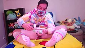 Chubby femboy eagerly stretches ass with massive dildos on bed