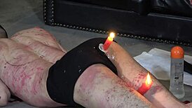 slave's ass burned by candle