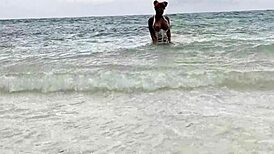 Monika Fox swims in the sea, fucks her pussy with a big dildo on the white sand beach!