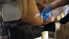 Pretty nurse fists, busts balls, and spanks patient