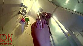 hidden camera in the shower room secretly films young 18+ naked girl stripping naked in the bathroom while showering