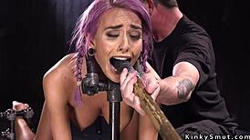 Purple-haired petite sub restrained in device bondage, experiencing rough hardcore fucking, tied up with pain and bizarre domination