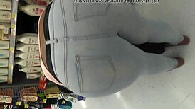 Filming the chubby woman shopping at the supermarket casually