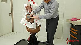 Ebony patient bound upside down in hospital eats doctor's ass and cum roughly