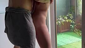 massive muscle milf's tight ass slammed against window by bodybuilder's huge cock as she screams