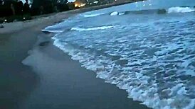 blonde teases with tits then drops for public beach cock suck