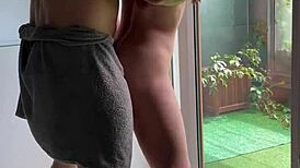 massive muscle milf's tight ass slammed against window by bodybuilder's huge cock as she screams